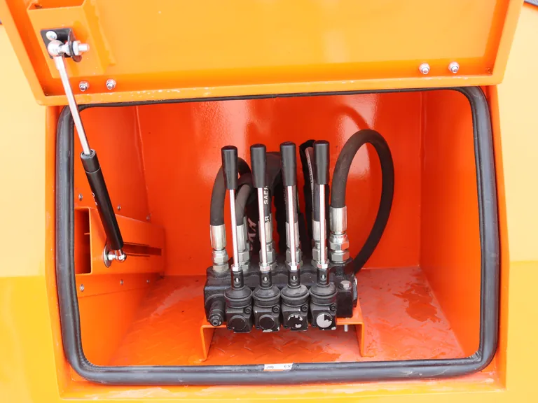 AQUILA 100 hand-control valve bank in a lockable body compartment.